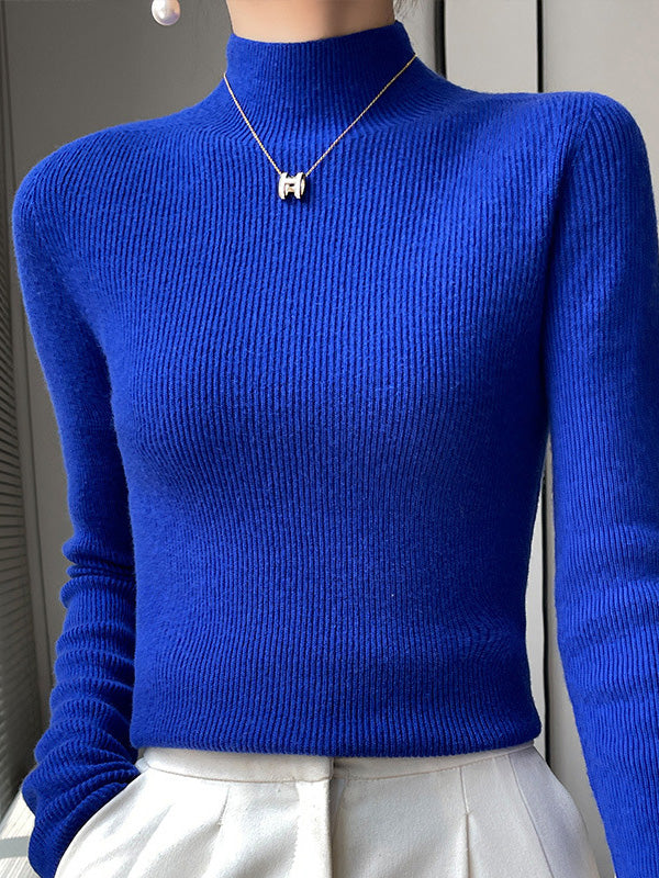 Women's beige ribbed knit turtleneck sweater with flattering slim fit and cozy high neck