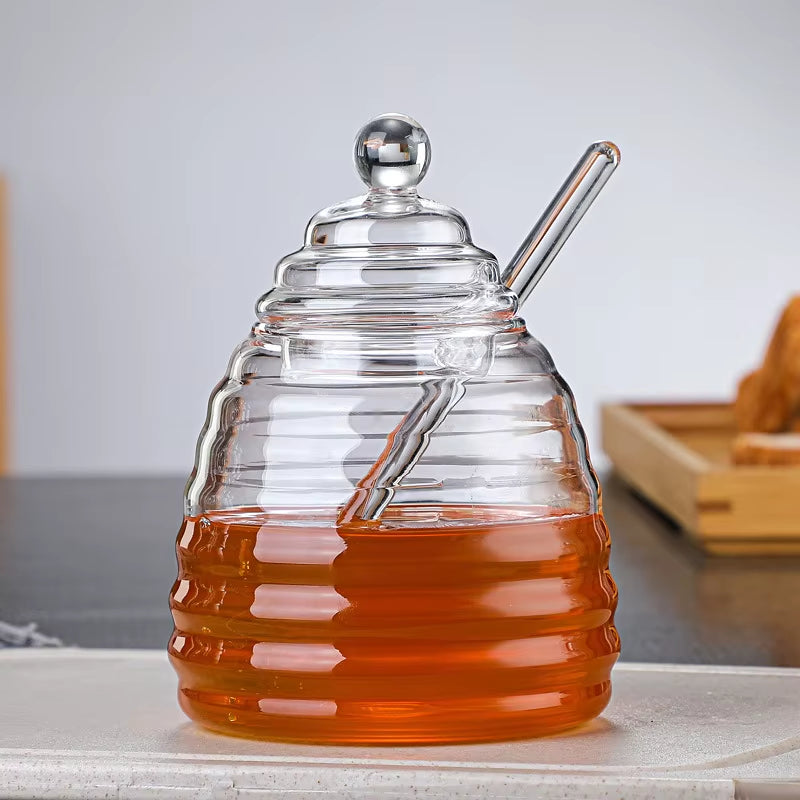 Hand-blown borosilicate glass beehive honey jar with airtight bee finial lid and honey dipper