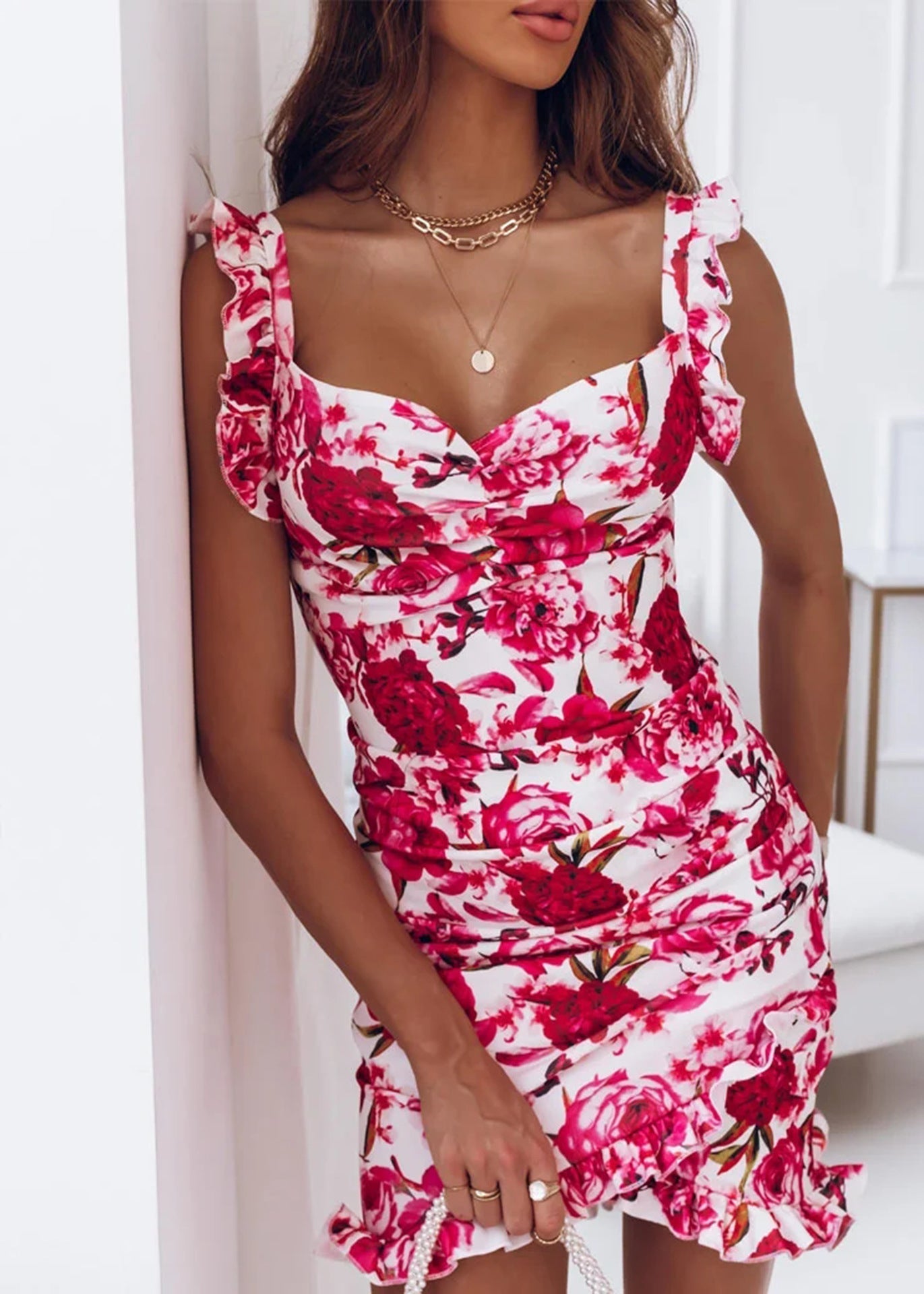 Floral print bodycon mini dress with V-neck ruched bust, delicate straps, and ruffled hem for women
