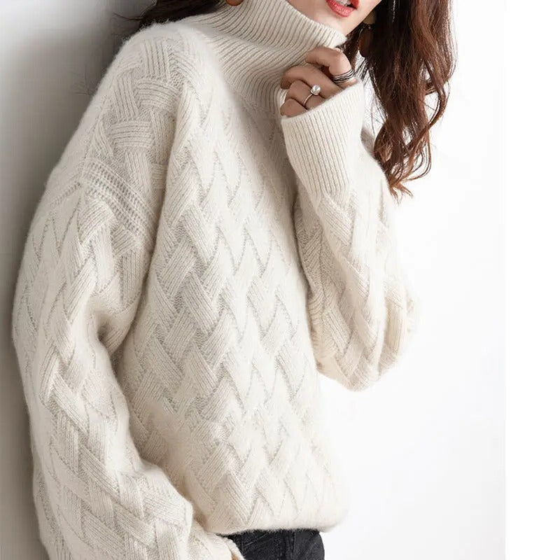 Women's ivory turtleneck sweater relaxed silhouette soft natural fiber knit elegant refined texture