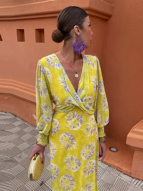Eleanor geometric print wrap midi dress with V-neck waist-defining silhouette in multicolor pattern