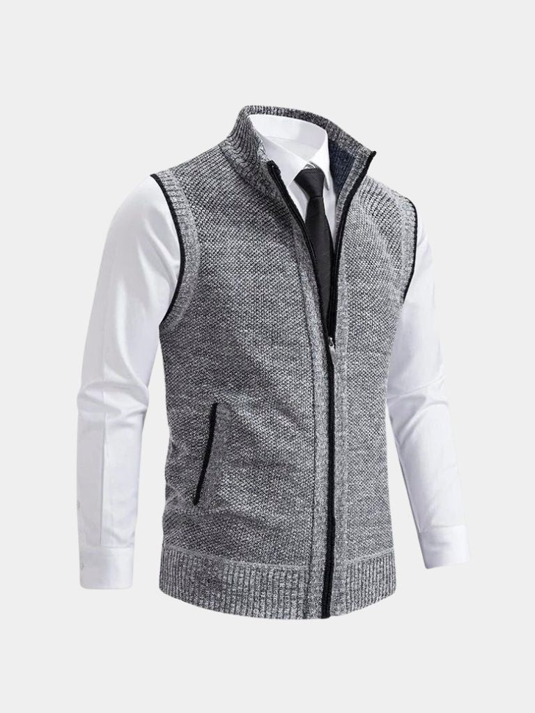 Men's dark textured knit zip-up vest with high collar and full front zipper for refined layering