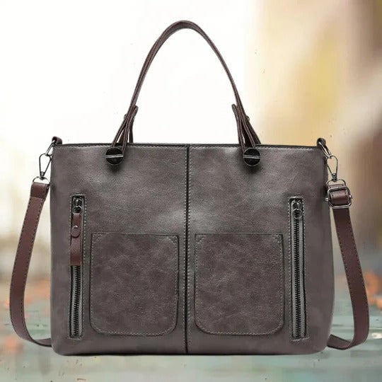 Structured black leather professional bag with spacious organization and sleek tailored silhouette