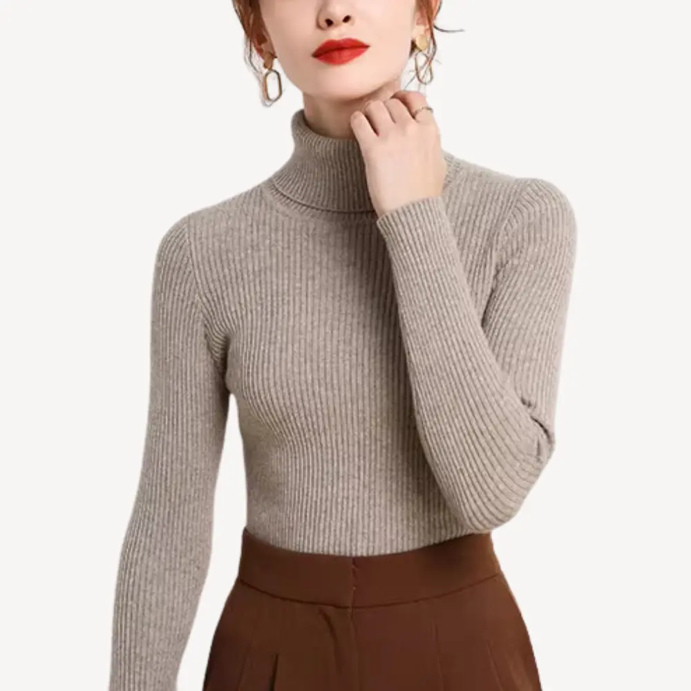 Women's slim-fit soft knit turtleneck sweater in warm cozy style with flattering silhouette