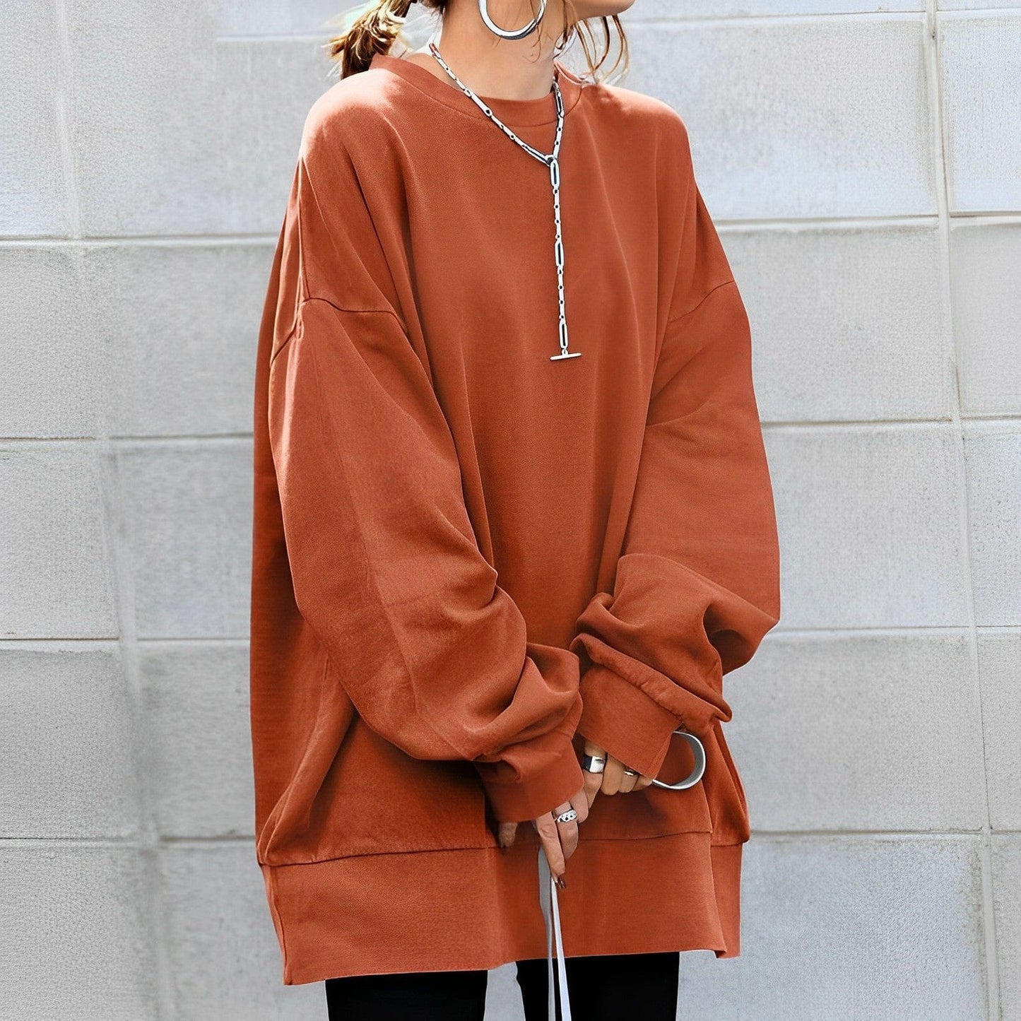 Women's oversized knit sweater loose casual fit cozy everyday streetwear layered silhouette