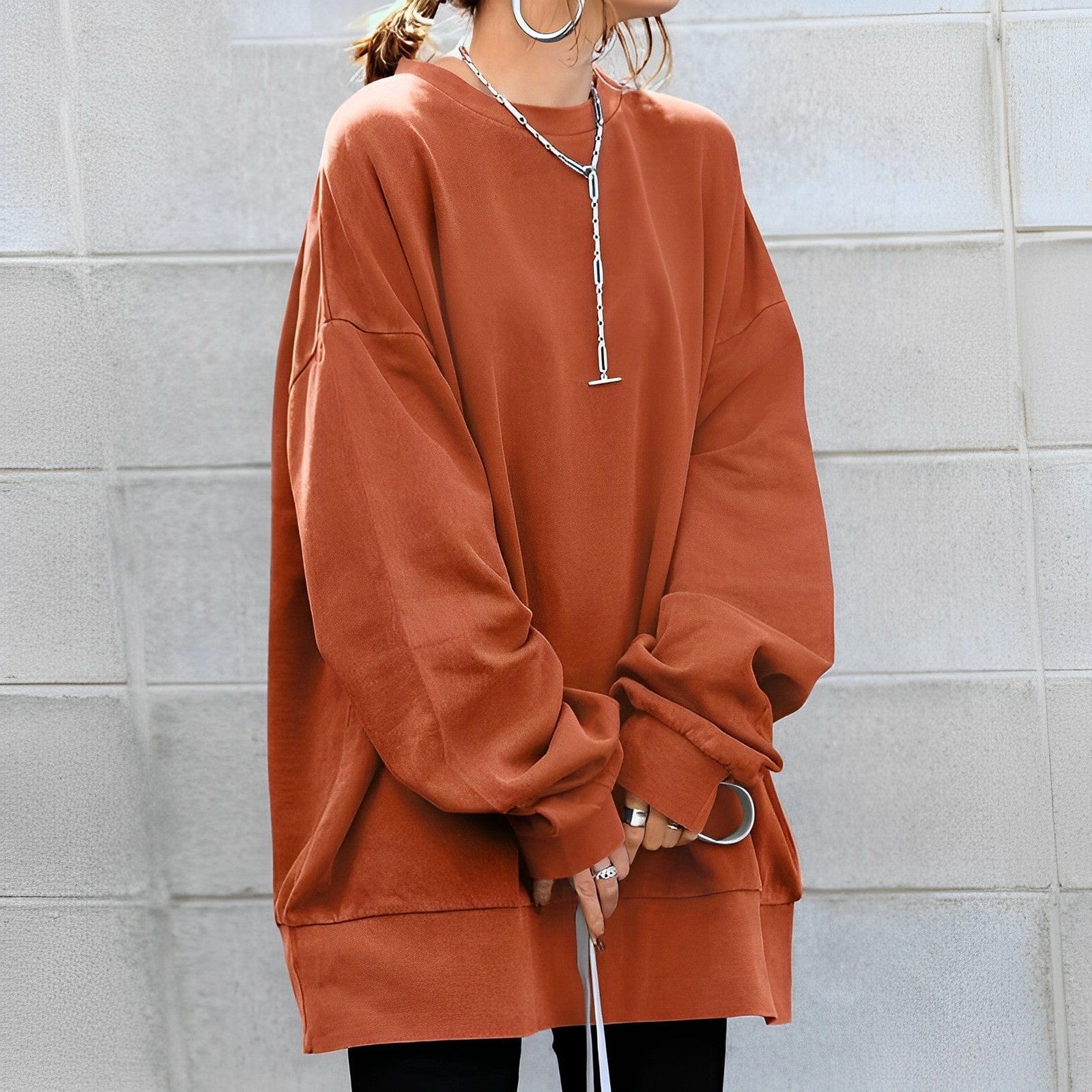 Women's oversized knit sweater loose casual fit cozy everyday streetwear layered silhouette