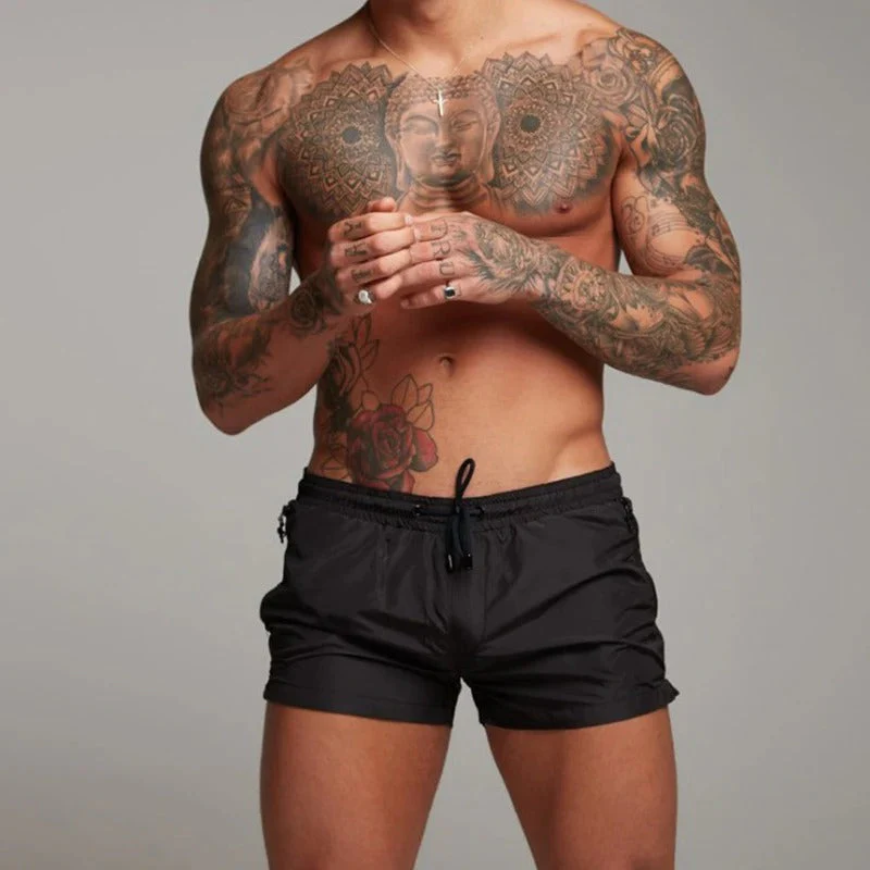 Enzo men's navy blue swim shorts with drawstring waist, short athletic cut and zip pockets