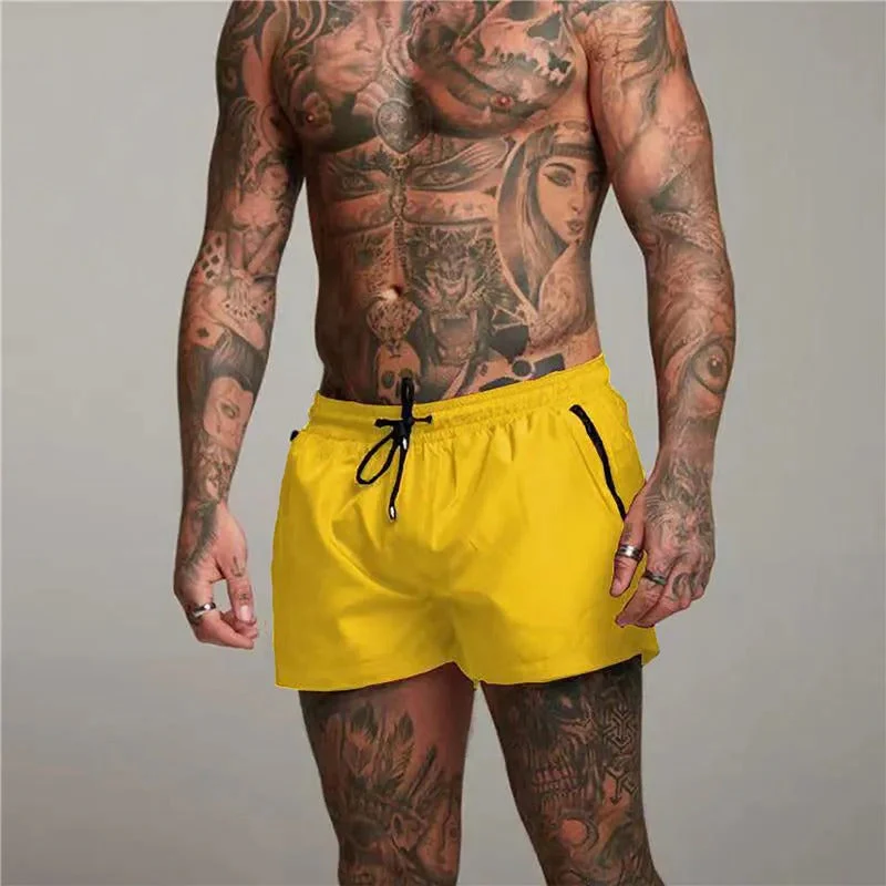 Enzo navy swim shorts with drawstring waist, short athletic cut and zip pockets for active swimmers