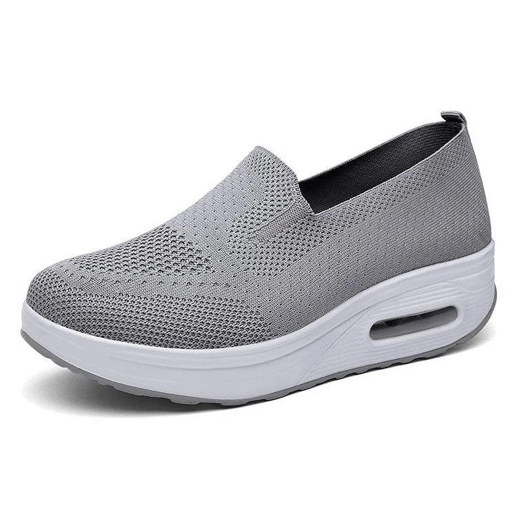 Lightweight slip-on walking shoes breathable knit upper cushioned air unit platform everyday comfort