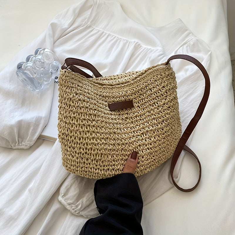 Women's braided saddle crossbody bag compact silhouette with long strap for city outings