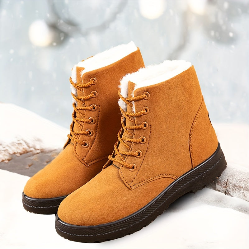 Women's ankle-high winter boots with lace closure, fleece lining, and profiled sole for cold weather