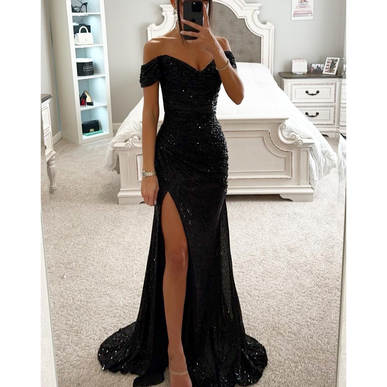 Glamorous off shoulder sequin evening dress with thigh-high slit, perfect for festive occasions