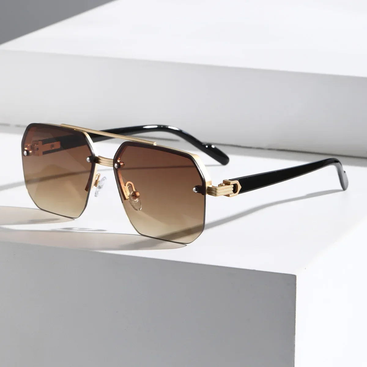 Aether geometric sunglasses UV400 gradient lenses precision-cut metal frame bold modern silhouette