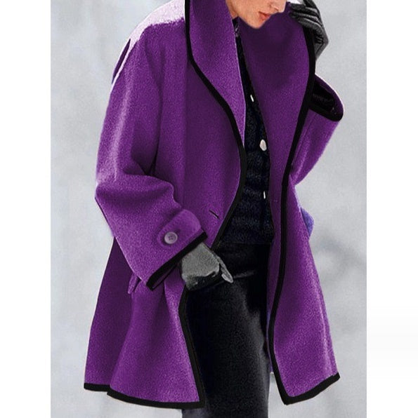 Women's loose fit coat with contrast piping trim, wide collar, bold elegant cut, versatile style