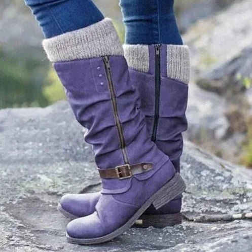 Women's knee-high buckle boots with knit cuff, textured sole, and side zip in versatile fall style