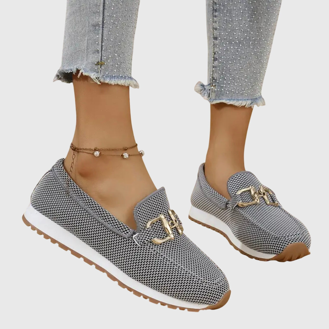 Women's black chain detail loafers with flexible sole and sleek classic silhouette
