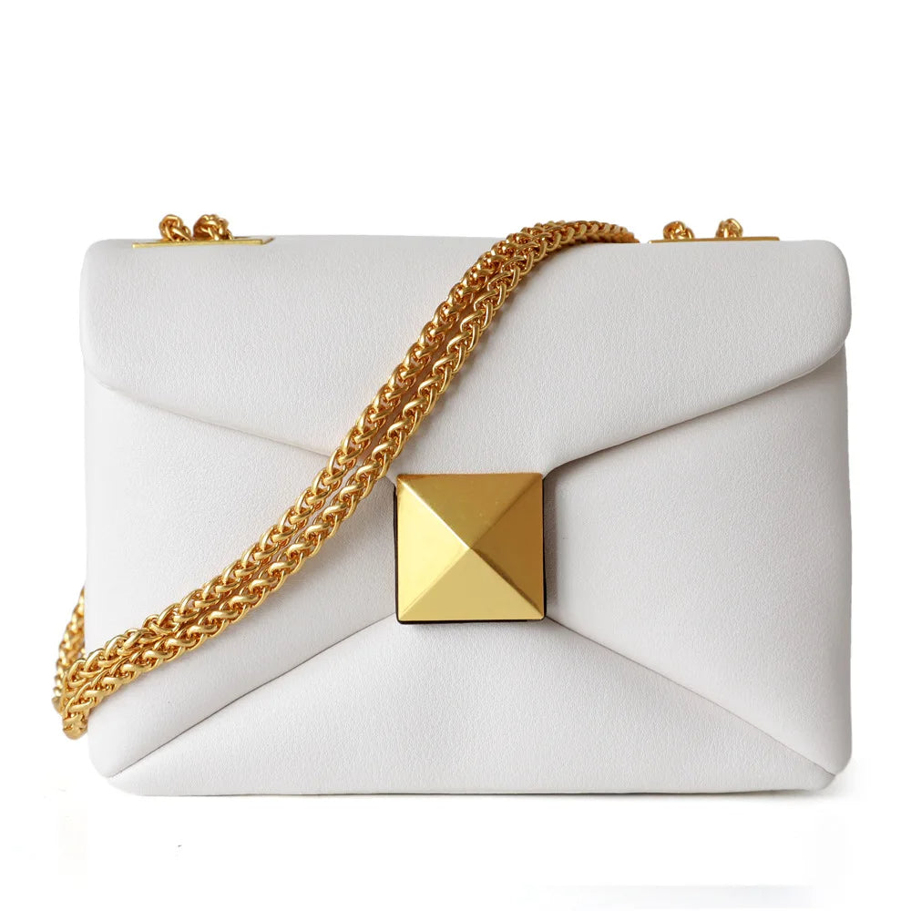 Valencia genuine leather handbag spacious tote with gold rivet chain detail for women