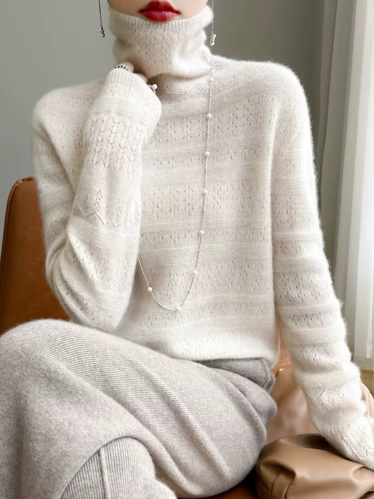 Women's featherlight wool turtleneck pullover in neutral tone with stacked collar and subtle knit pattern