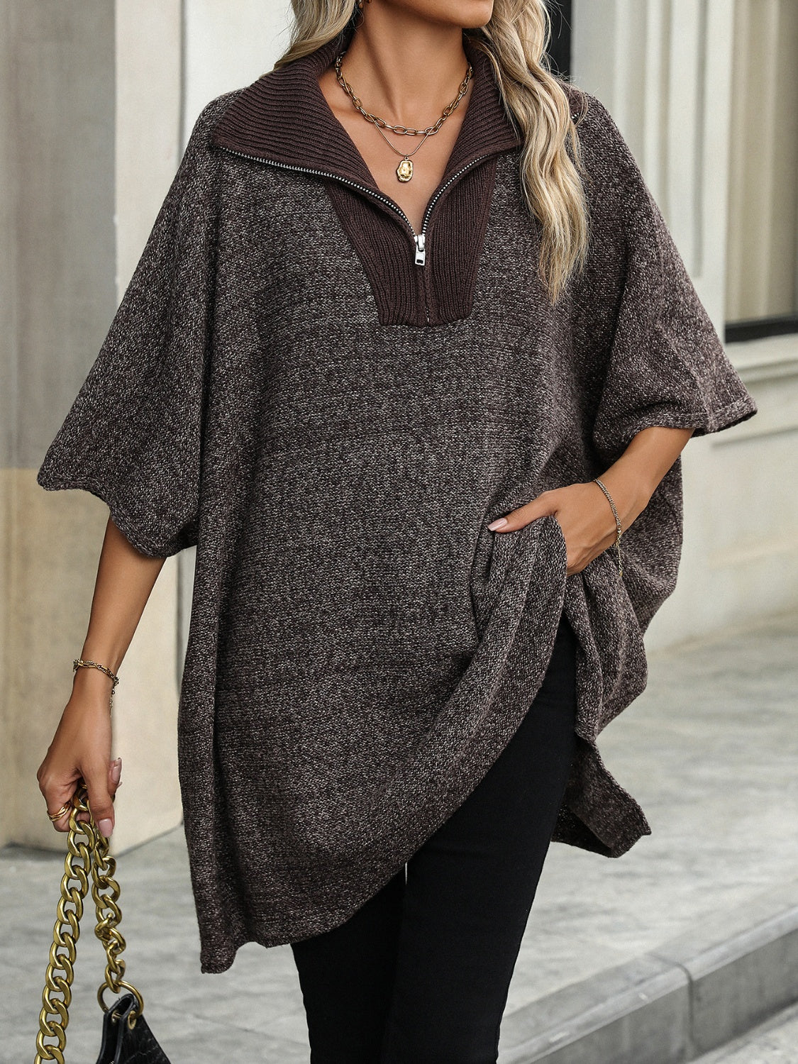 Women's quarter-zip sweater elegant side slits sleek low-profile zipper versatile layering essential
