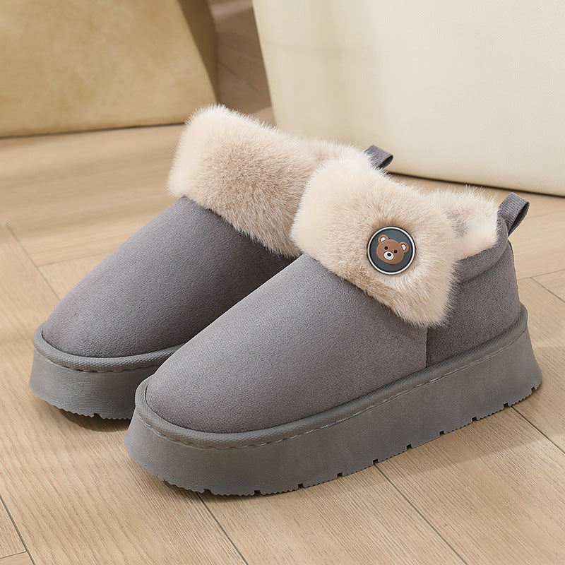 Women's ankle-high slip-on slipper boots with plush fleece interior, faux fur trim, and button details