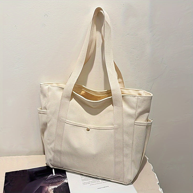 Women's minimalist shoulder bag with secure zipper, long straps, and spacious interior for everyday use