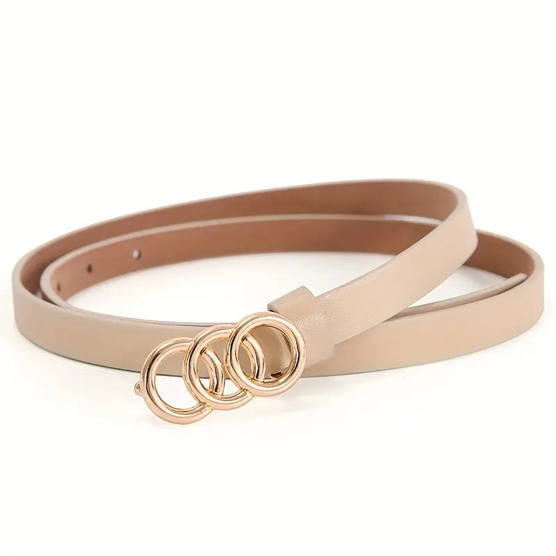 Women's black vegan leather adjustable belt with triple circular buckles, slim silhouette