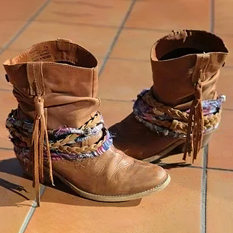 Women's vintage western ankle boots with braided tassel detail, block heel, and tribal-inspired PU upper