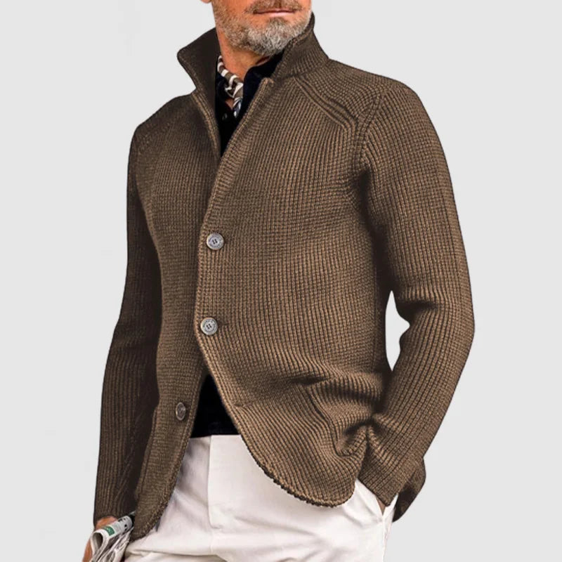 Men's navy blue knit cardigan with button closure, long sleeves, and cozy Nordic-style layering fit