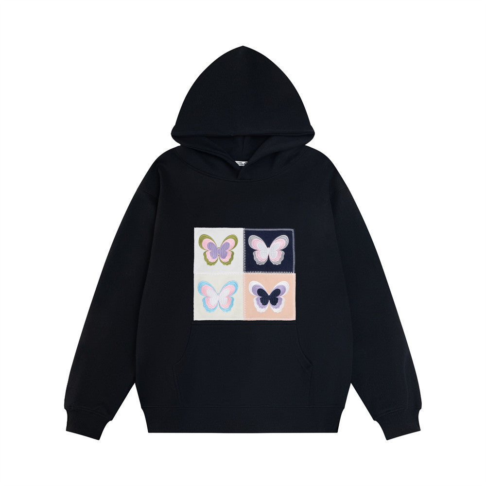 Women's cozy hoodie with embroidered butterfly patch, relaxed fit, soft fabric, playful streetwear style