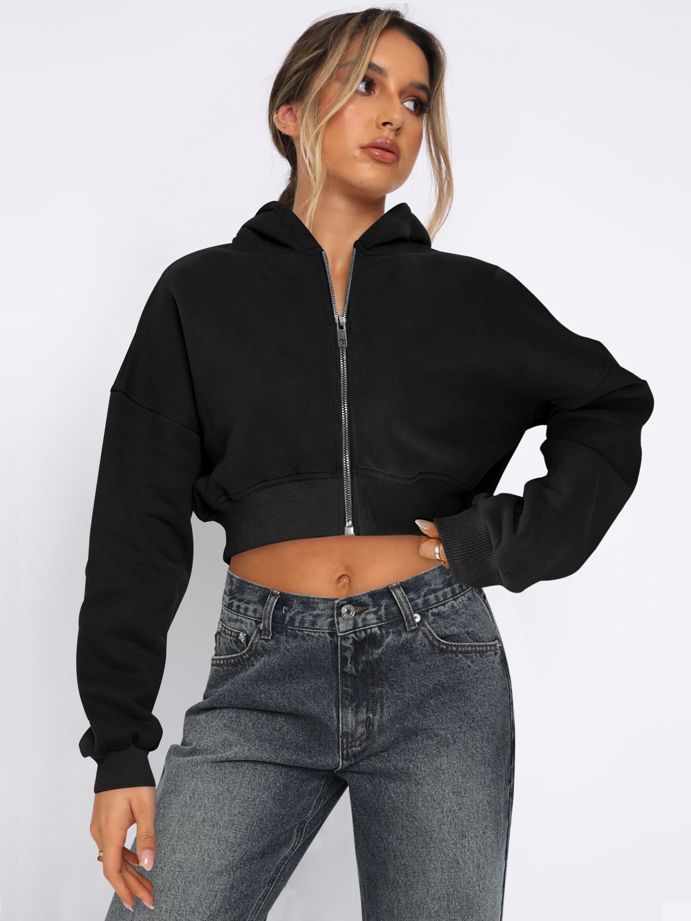 Women's cropped fleece zip hoodie in soft fabric, streetwear-inspired silhouette with waist-defining cut
