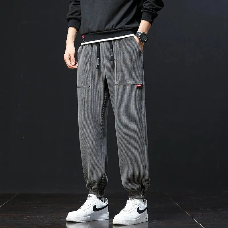 Beige corduroy sweatpants relaxed fit lounge style with adjustable waistband and deep side pockets