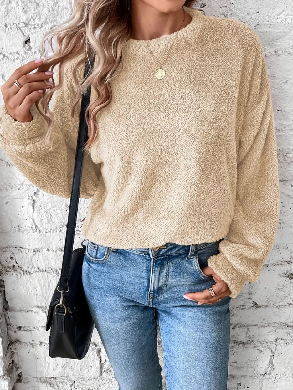 Women's ultra-soft teddy fleece sweatshirt in cozy modern fit, warm plush fabric for cold days