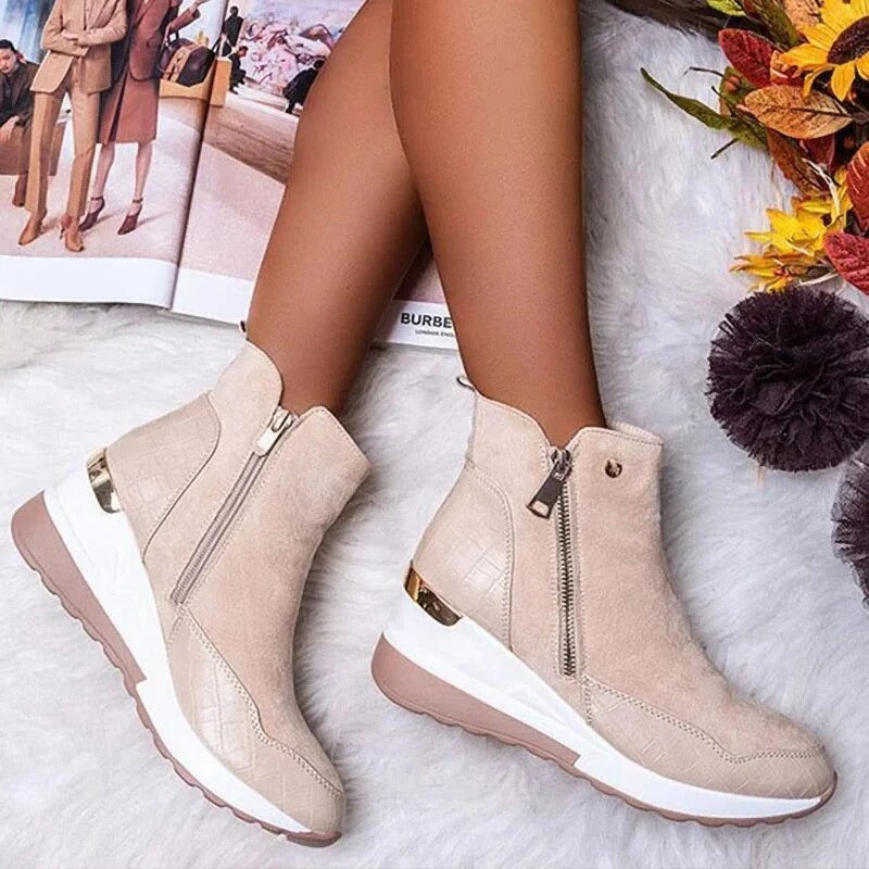 Women's black zip-up ankle boots sleek modern silhouette weatherproof cozy winter style