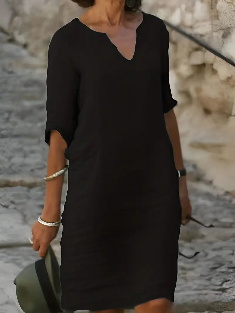 Women's casual relaxed fit 3/4 sleeve dress in versatile everyday style with soft drape silhouette