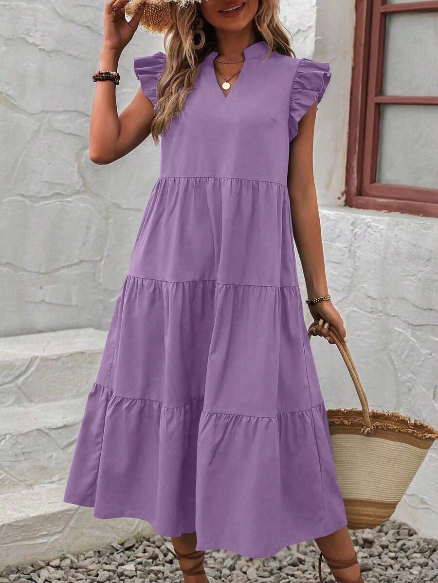 Green loose-fit midi dress with ruffle shoulders, V-neck, and flowy ruched silhouette for women