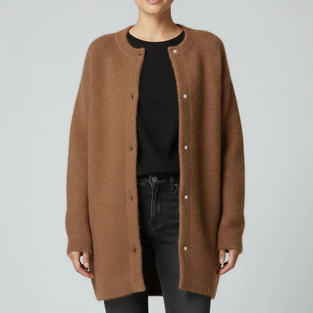 Women's oversized collarless cardigan with button-down front, relaxed minimalist style for effortless layering