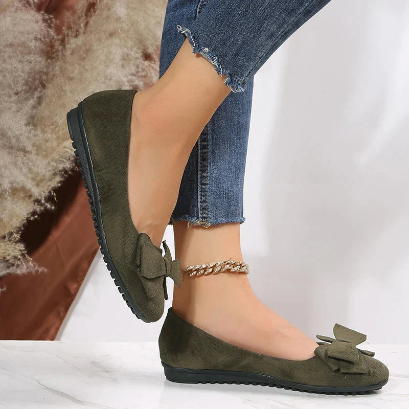 Women's slip-on ballet flats with decorative bow accent, chic flat sole design for work and everyday