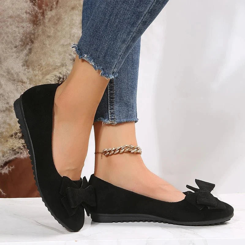 Women's slip-on ballet flats with bow accent, chic flat sole design for work and everyday comfort