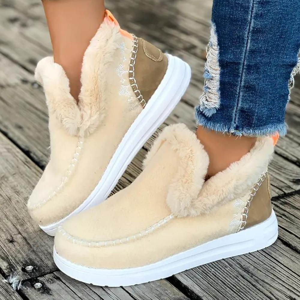 Women's winter boots with warm lining, cozy sustainable design for cold weather comfort