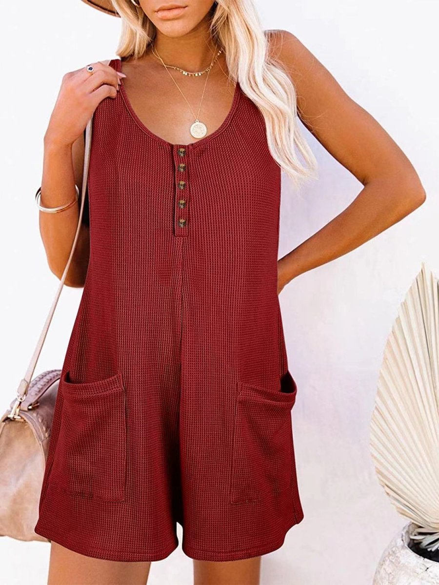 Sleeveless scoop neck romper with functional pockets, relaxed fit, casual chic style for women