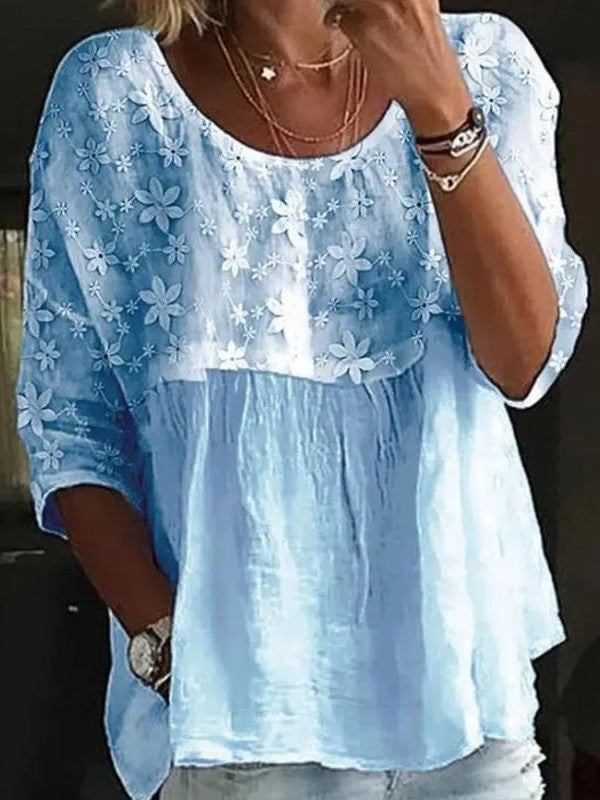 Women's loose fit white shirt with delicate lace embroidery and three-quarter sleeves, everyday chic style