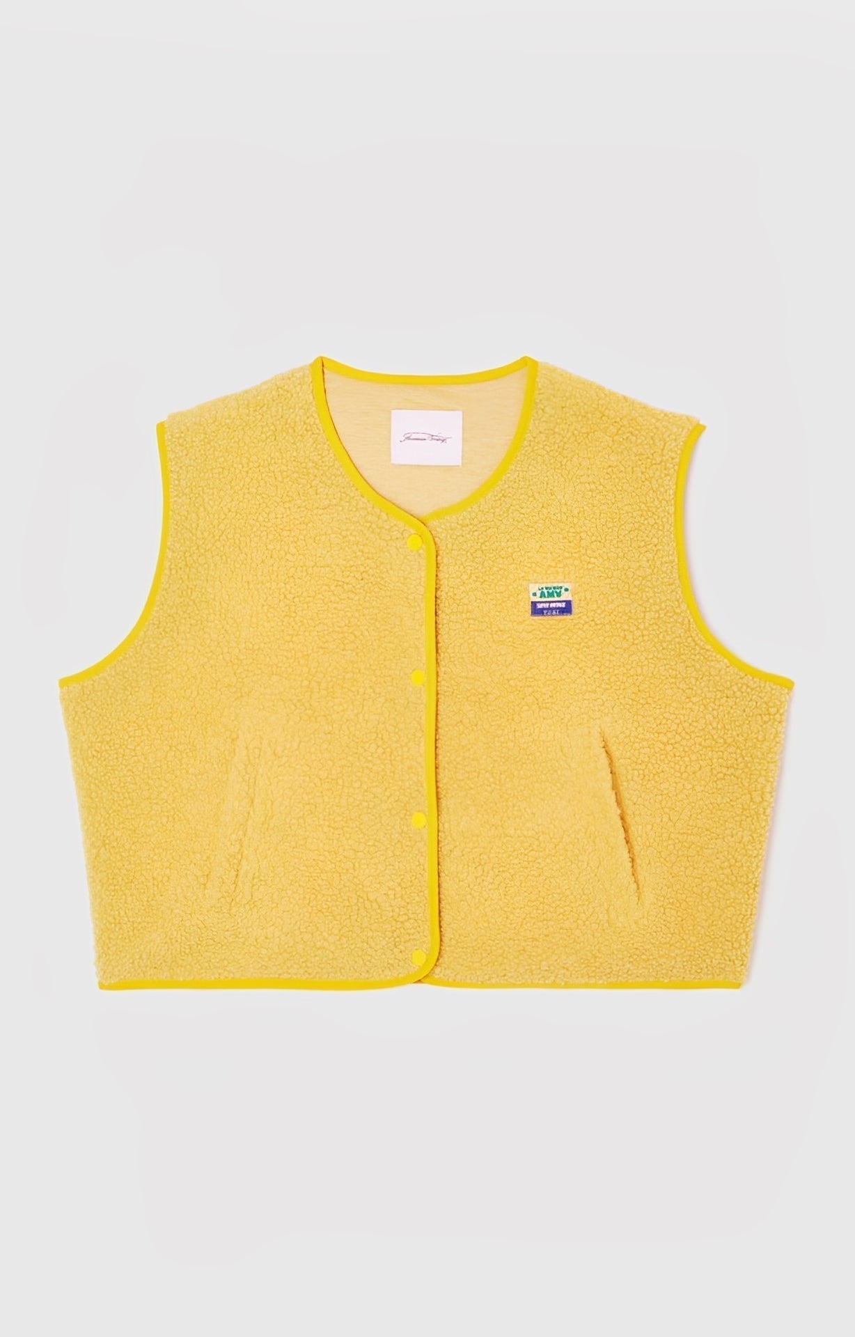 Women's button-front vest timeless versatile layering piece with clean streamlined closure for everyday elegance