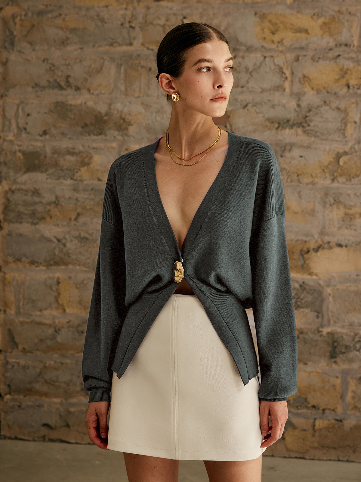 Women's elegant knit cardigan regular fit workwear style with distinctive golden buttons closure
