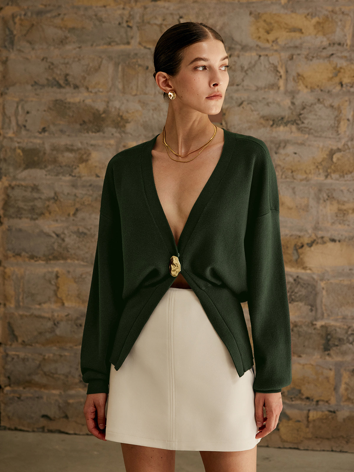 Women's elegant knit cardigan regular fit workwear style with distinctive golden buttons