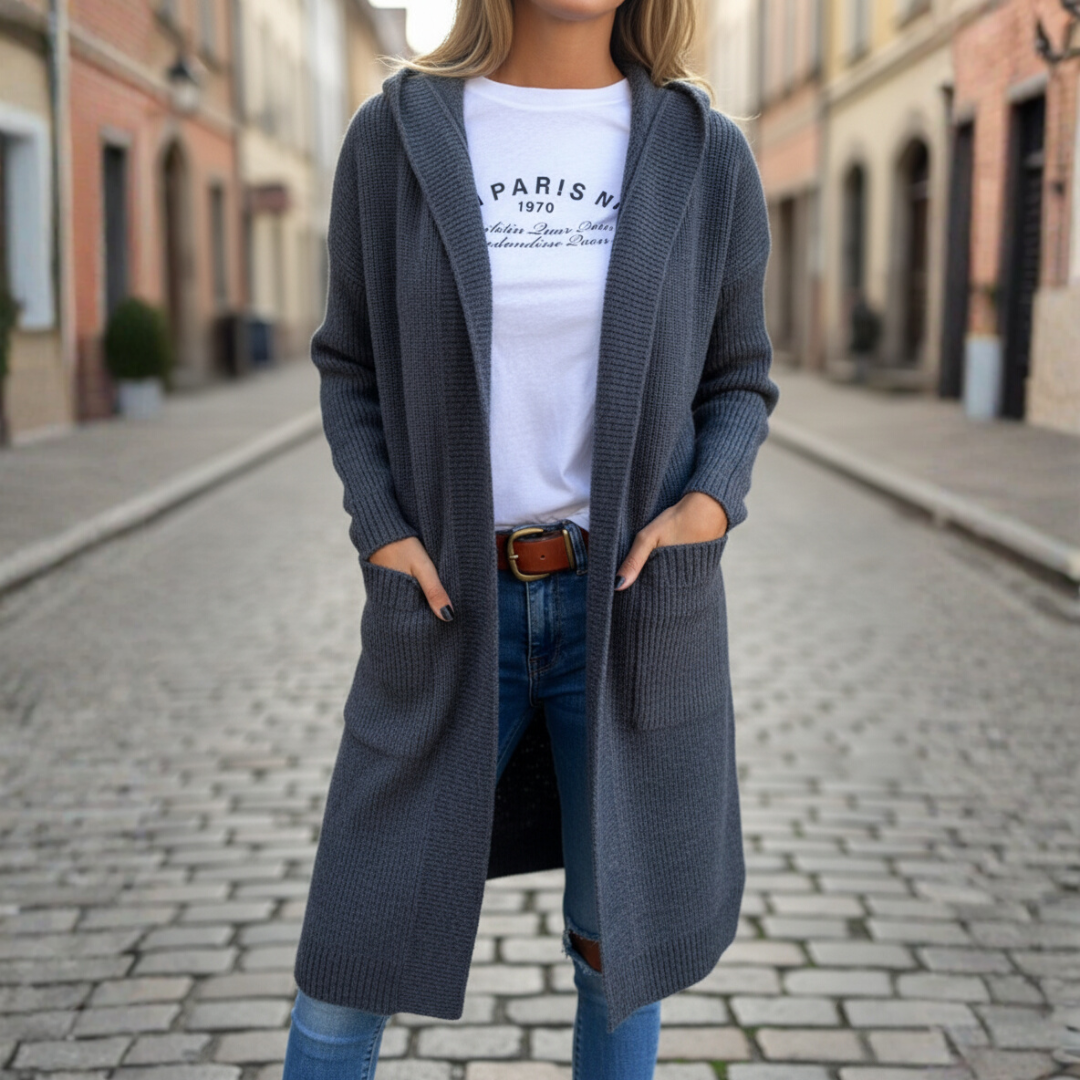 Women's long hooded knit cardigan with front pockets and button closure, cozy acrylic everyday essential