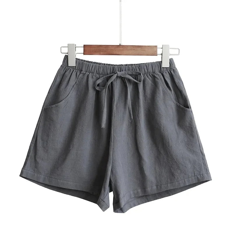 Plus size high-waisted linen blend shorts in neutral tones, vintage-inspired silhouette for beach days