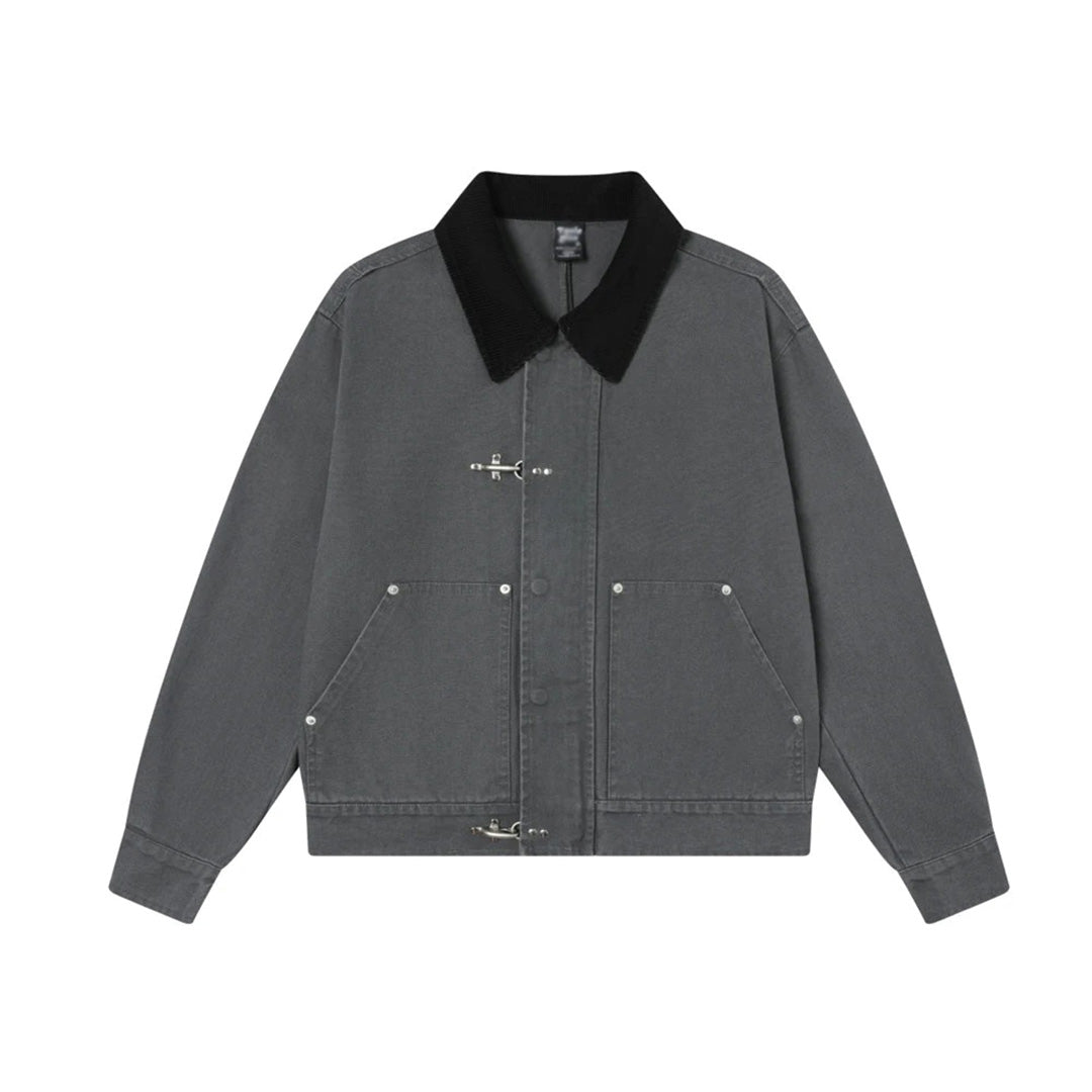 Garment-dyed cotton utility jacket structured silhouette bold metal hook closures urban workwear style