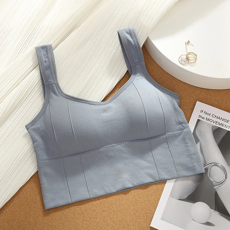 Black seamless longline sports bra with sculpted ribbed fabric, full coverage, zero ride-up active fit