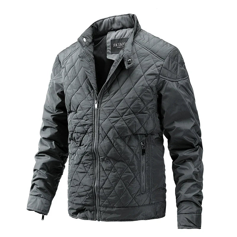 Men's navy quilted jacket with stand collar, full zip closure, and hip-length regular fit silhouette