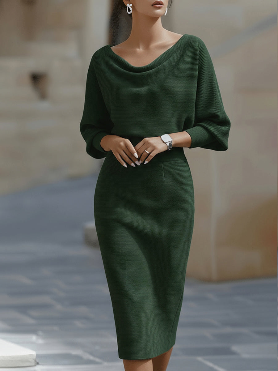 Draped midi knit gown in elegant neutral tone, fluid silhouette with draped neckline for evening wear
